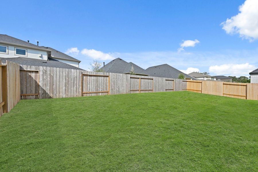 Exterior details and patio area of a home in Barton Creek Ranch, Conroe (Image 3). Exterior details and patio area of a home in Barton Creek Ranch, Conroe (Image 3).