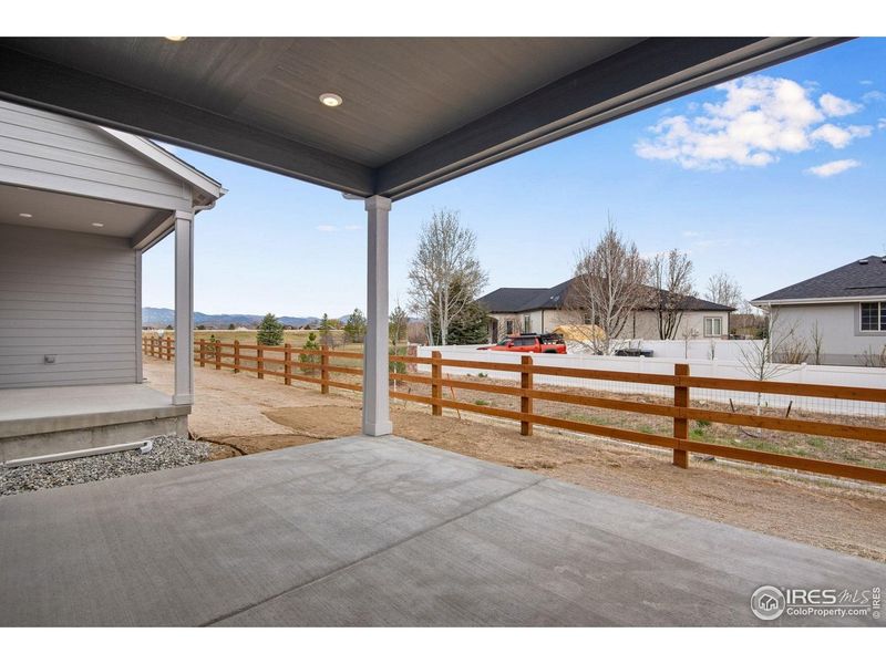 Exterior details and patio area of a home in Westside Crossing, Berthoud (Image 25).