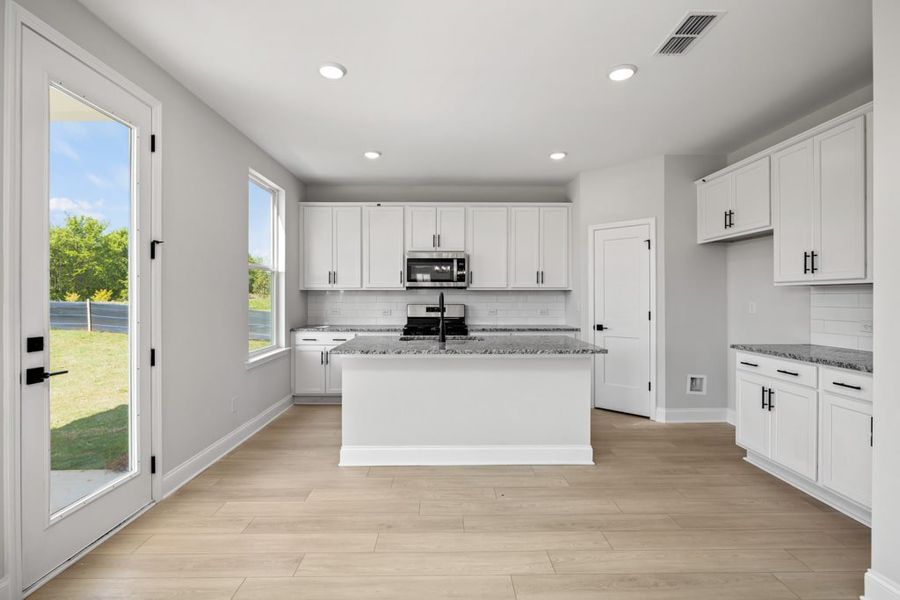 Representative furnished interior of a home built from the The Baldwin by UnionMain Homes in Austin Springs, Bethlehem (Image 6).