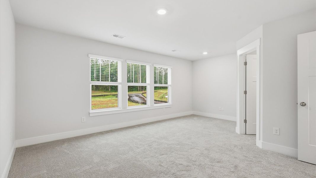 Luxurious primary retreat with spacious proportions and calming ambiance in Lyman, SC Luxurious primary retreat with spacious proportions and calming ambiance in Lyman, SC