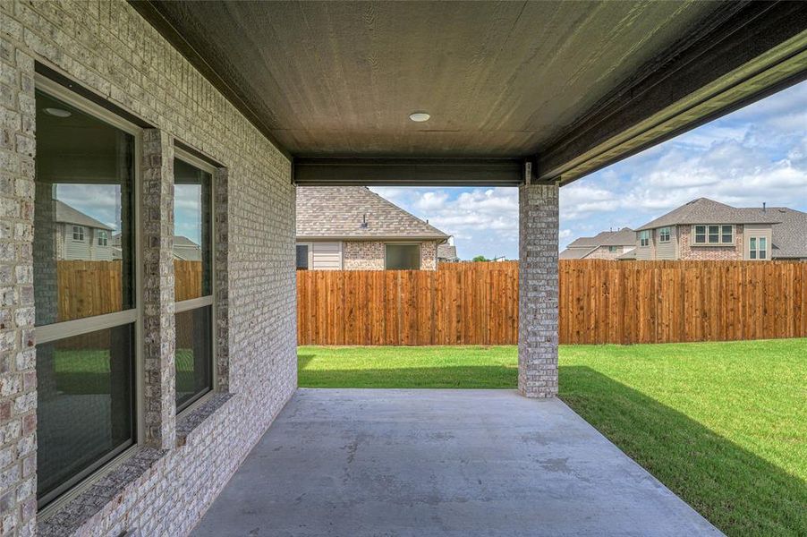 Exterior details and patio area of a home in Stone River Glen, Royse City (Image 4).