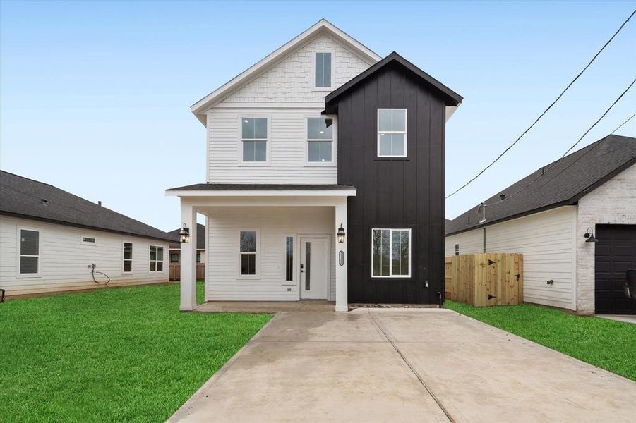 Welcome to 11190 Fieldcrest! Its’ sleek Hardiplank exterior showcases a striking high-contrast color scheme, creating an eye-catching first impression. A charming covered front porch invites you to sit and unwind, while the spacious double-wide driveway offers ample parking for family and guests.