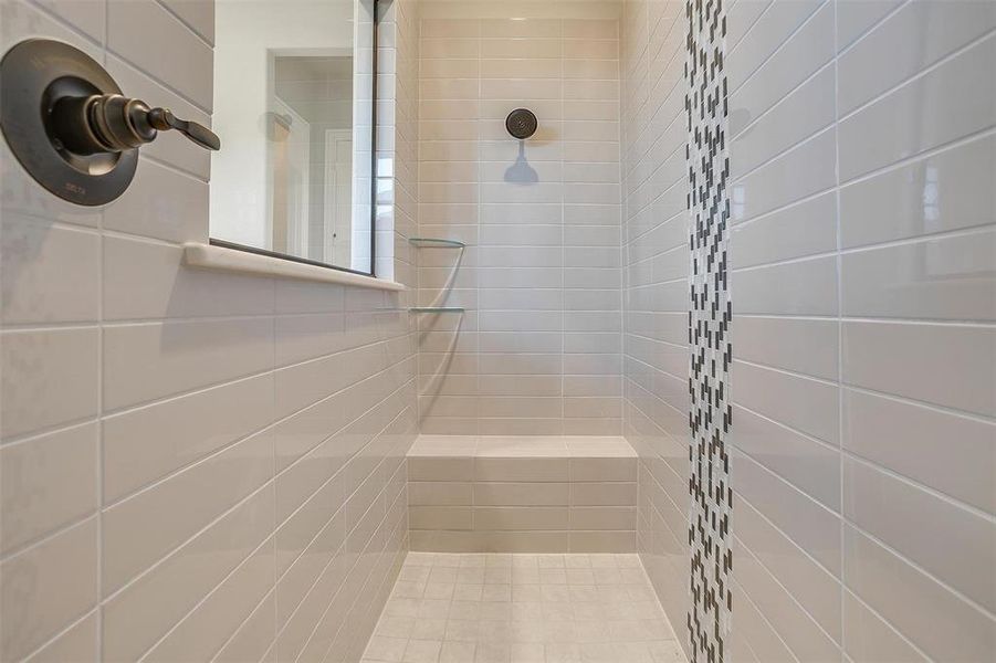 Bathroom with a tile shower