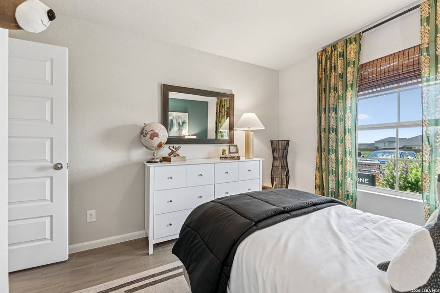 Furnished interior view inside a new home in Cinco Lakes, San Antonio (Image 25).