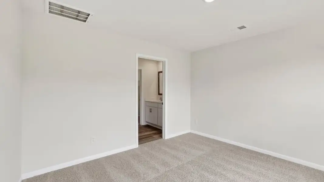 Spacious, unfurnished interior of a new home in Waverly Station, Greenwood (Image 30).