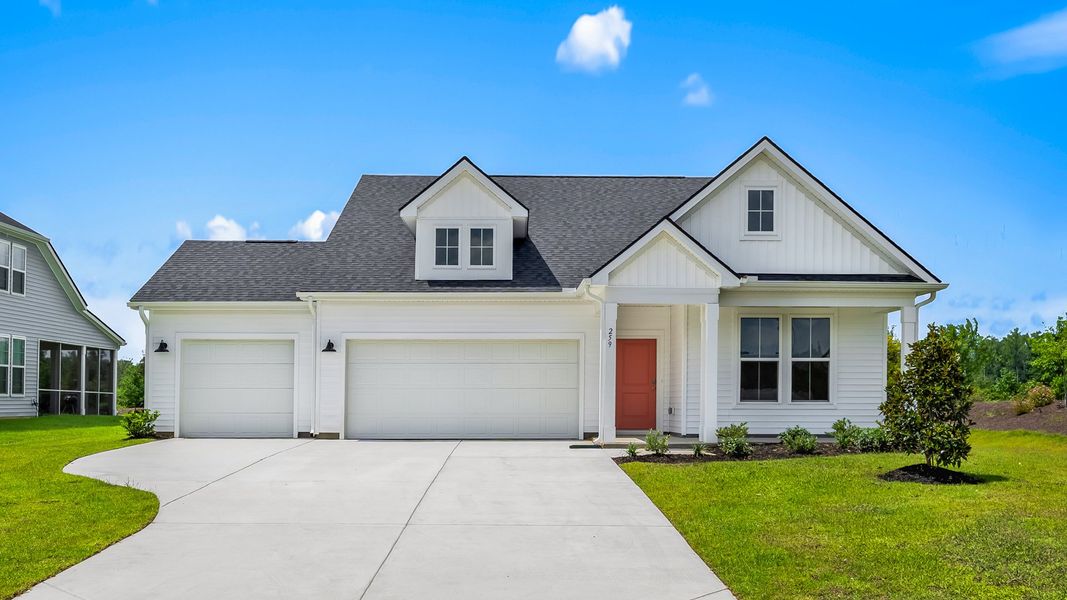 Easton Elevation 5 in Chestnut Farms, featuring a classic exterior with dormer windows and a welcoming covered entry Easton Elevation 5 in Chestnut Farms, featuring a classic exterior with dormer windows and a welcoming covered entry