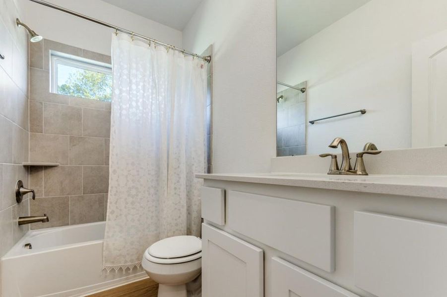 Furnished interior view inside a new home in Deer Pines, Conroe (Image 14).