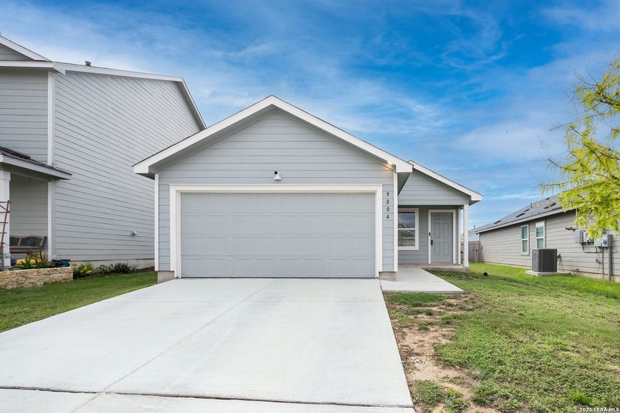 Front exterior of a new home in Waterwheel, San Antonio, TX, highlighting curb appeal (Image 14).