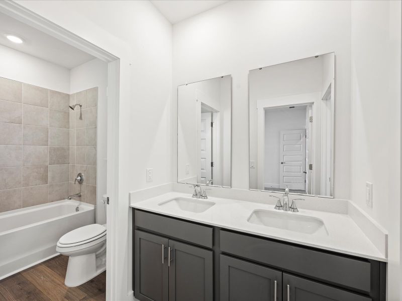 Furnished interior view inside a new home in The Coves at Lakes of Cane Bay II, Summerville (Image 11).
