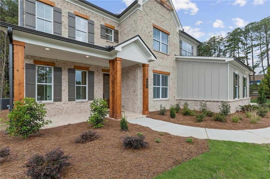 Exterior details and patio area of a home in The Reserve at Knollwood, Canton (Image 26).