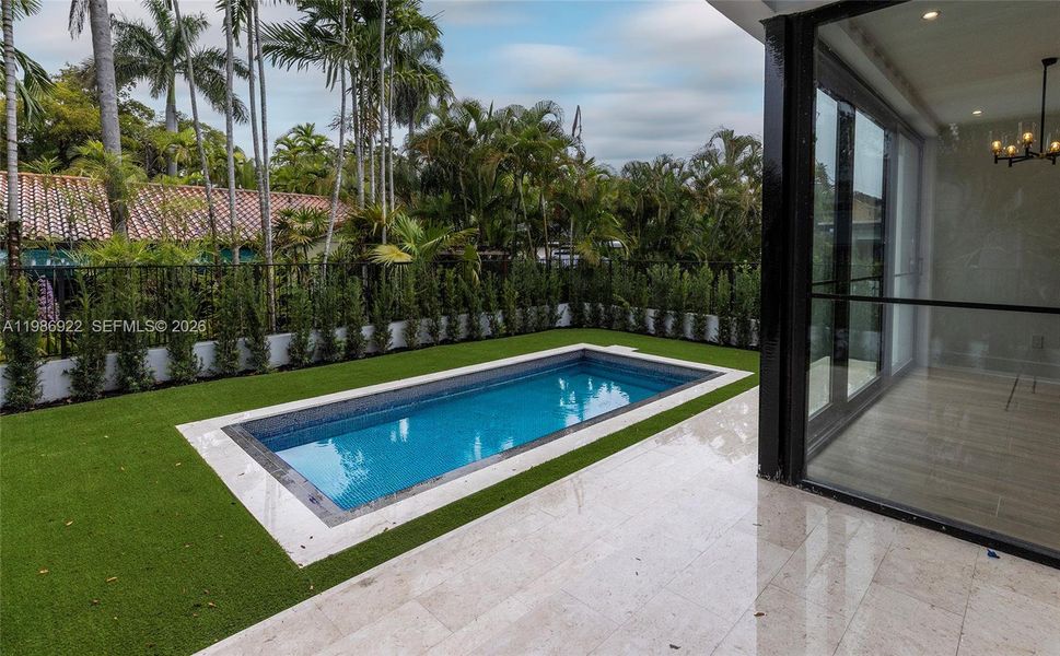 Exterior details and patio area of a home in , Coral Gables (Image 18).
