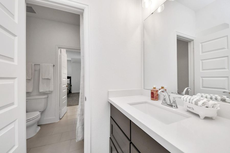 Conveniently located bathroom serving secondary bedrooms.
