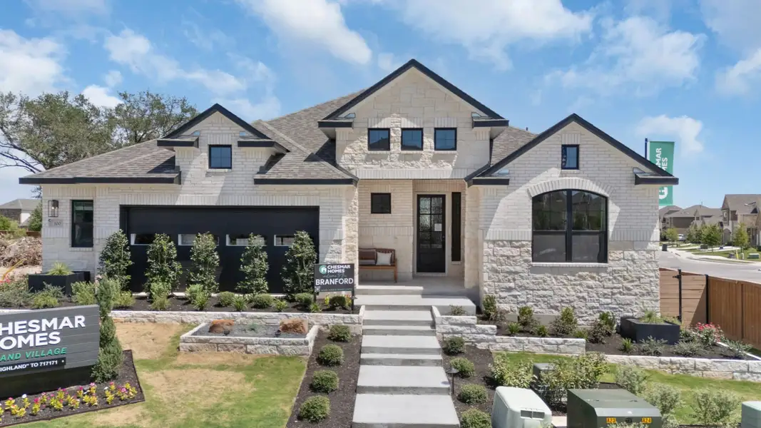 Representative exterior photo of a completed home built from the Branford by Chesmar Homes in Highland Village, Georgetown, TX (Image 1).