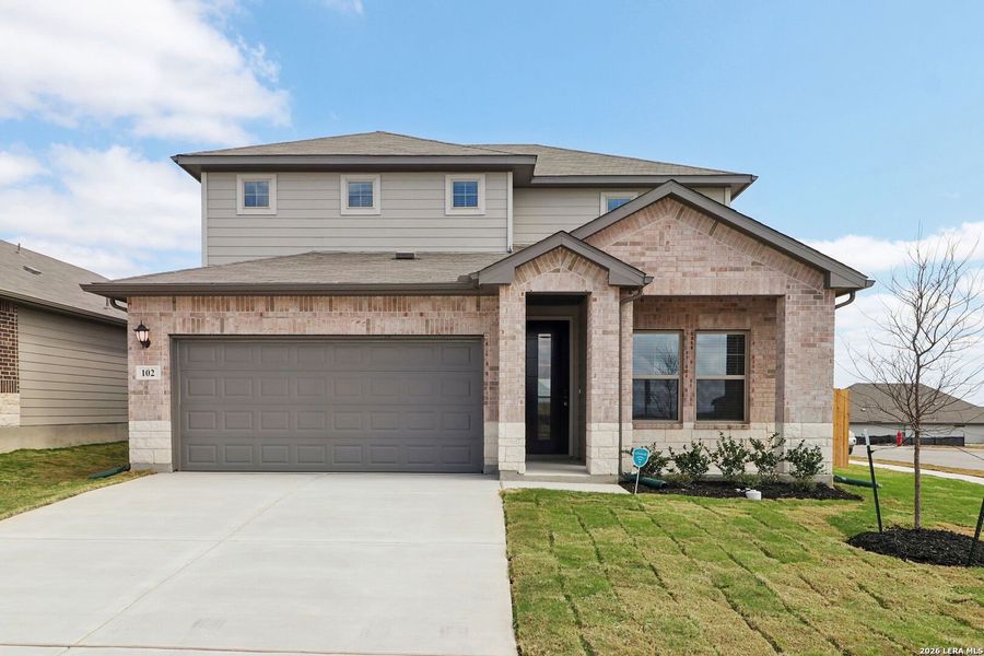 Front exterior of a new home in Legendary Trails - Premier Series, Cibolo, TX, highlighting curb appeal (Image 24).