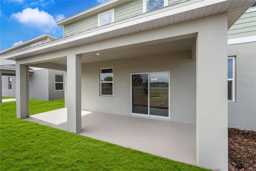 Exterior details and patio area of a home in Hidden Cove, Eustis (Image 26).