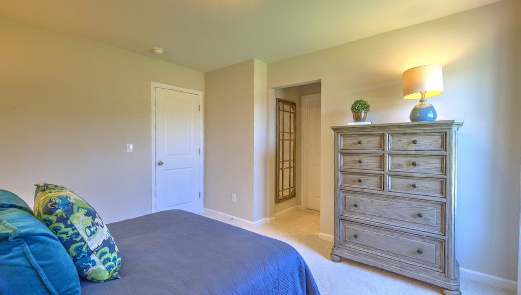 Furnished interior view inside a new home in Reserve at Tap Root Farms, Fletcher (Image 46).