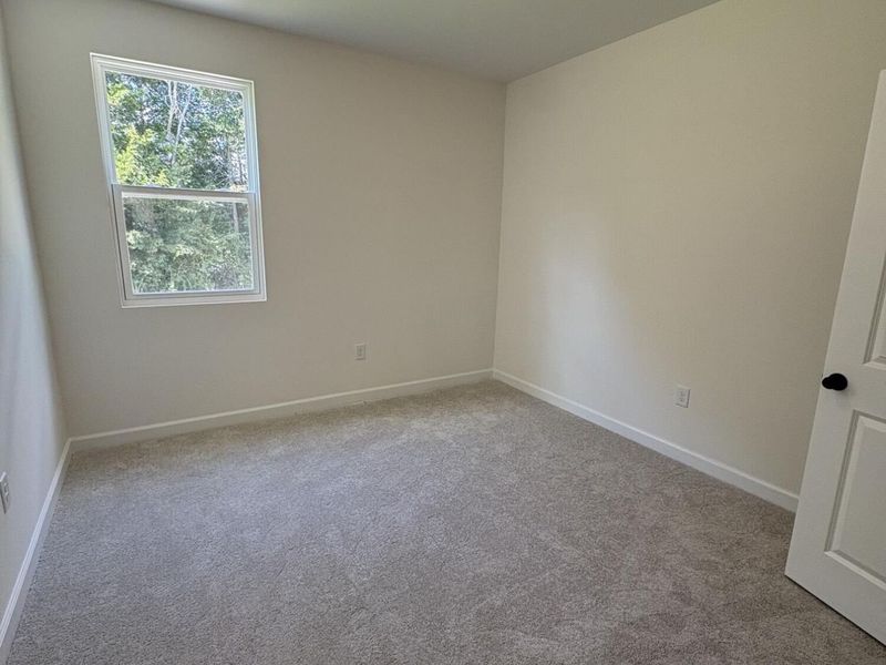 Spacious, unfurnished interior of a new home in Woodland Crossing, Zebulon (Image 33).