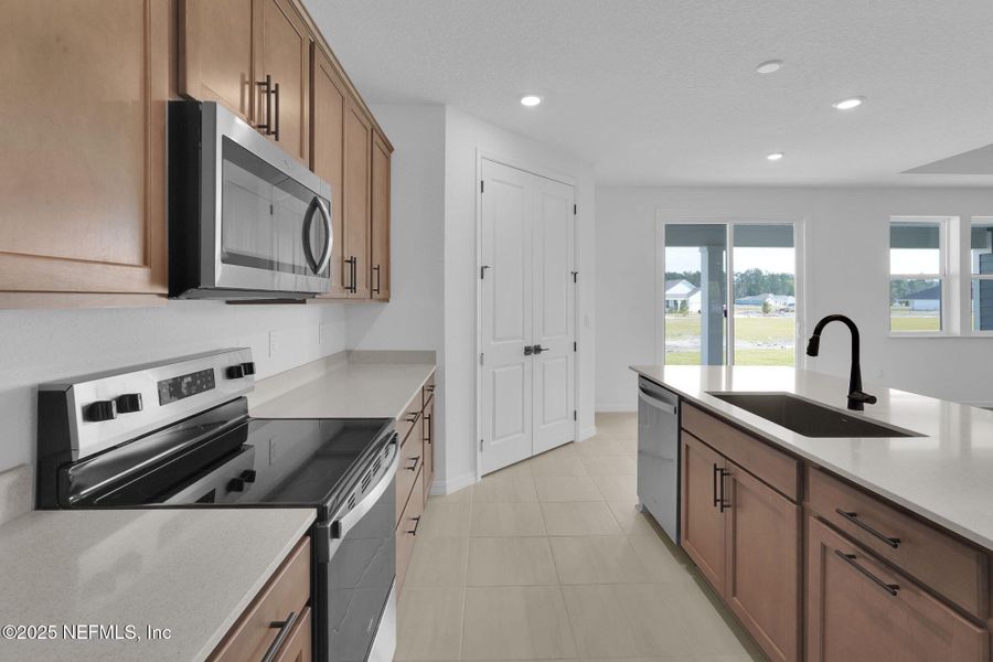 Furnished interior view inside a new home in Hyland Trail, Green Cove Springs (Image 8).