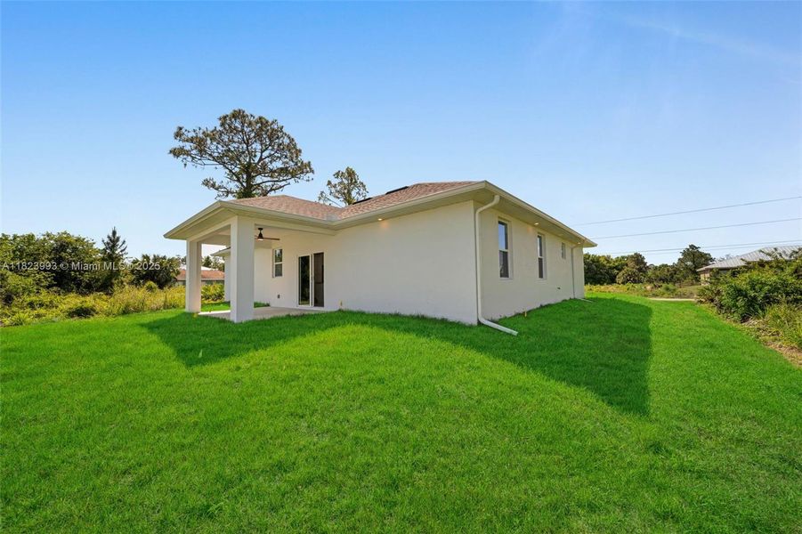Exterior details and patio area of a home in , Lehigh Acres (Image 21). Exterior details and patio area of a home in , Lehigh Acres (Image 21).