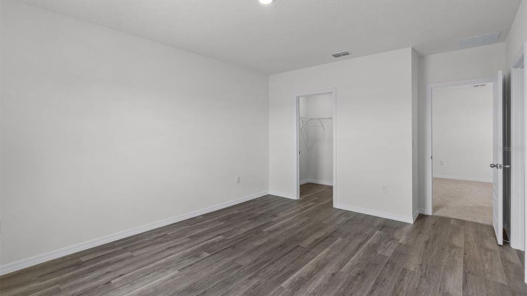 Spacious, unfurnished interior of a new home in Harmony at Lake Eloise, Winter Haven (Image 14).