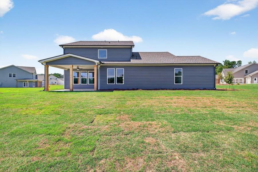 Front exterior of a new home in , Good Hope, GA, highlighting curb appeal (Image 21). Front exterior of a new home in , Good Hope, GA, highlighting curb appeal (Image 21).