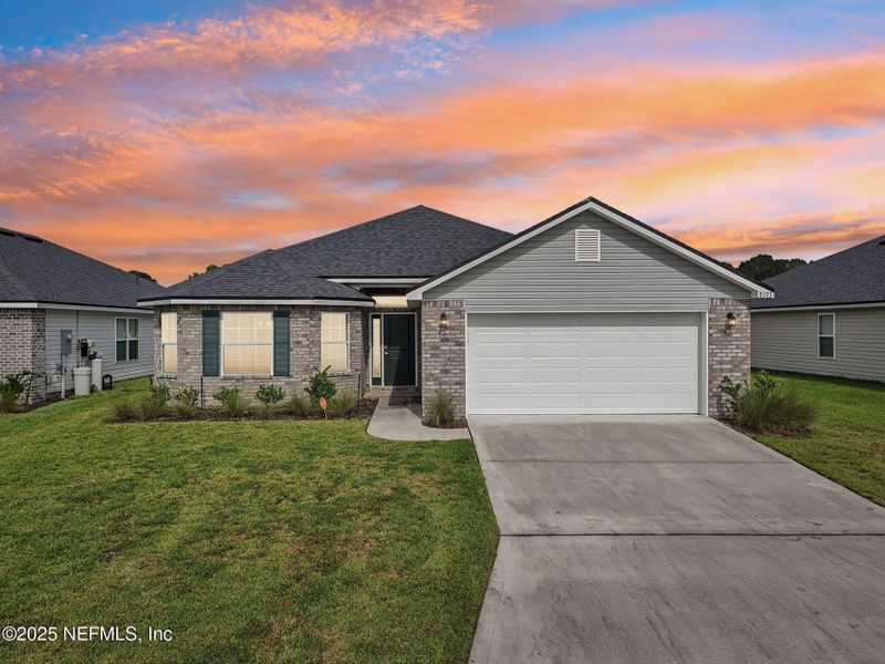Front exterior of a new home in , Jacksonville, FL, highlighting curb appeal (Image 26). Front exterior of a new home in , Jacksonville, FL, highlighting curb appeal (Image 26).
