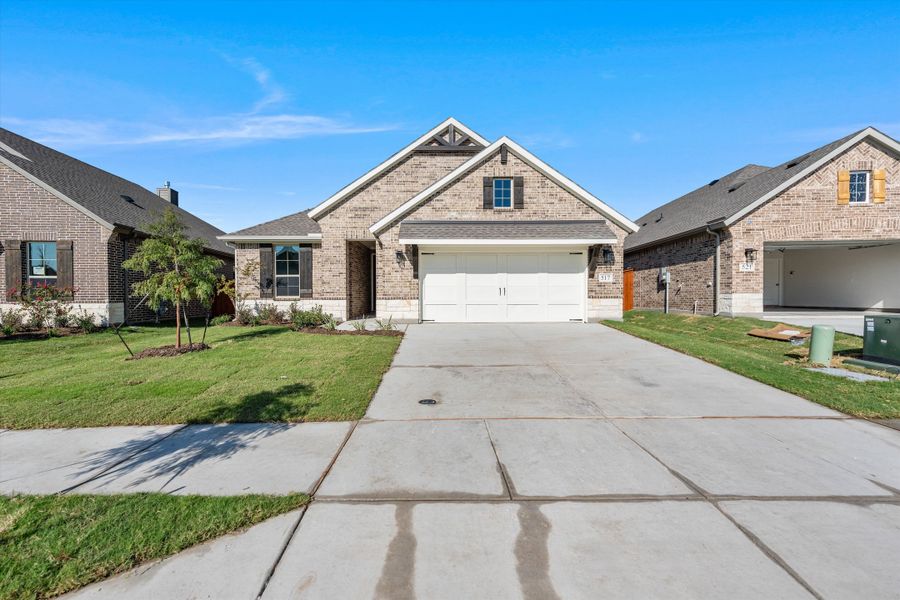 Front exterior of a new home in Morningstar, Aledo, TX, highlighting curb appeal (Image 25).
