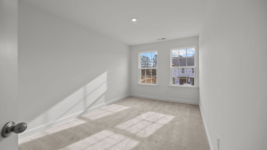 Furnished interior view inside a new home in Bell Glen, Charlotte (Image 16).