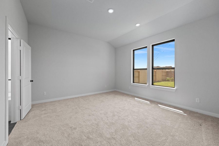 Spacious main bedroom nestled in on the 1st floor in the rear of the home. Spacious main bedroom nestled in on the 1st floor in the rear of the home.