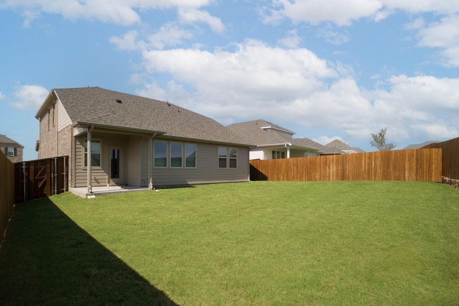 Exterior details and patio area of a home in The Villages of Hurricane Creek, Anna (Image 2).
