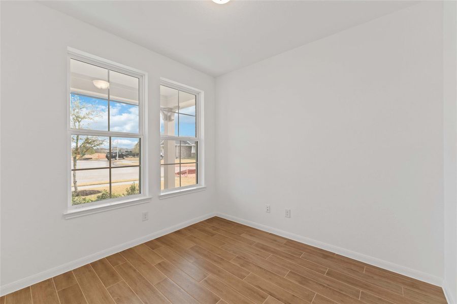 Spacious, unfurnished interior of a new home in Sunterra, Katy (Image 12).