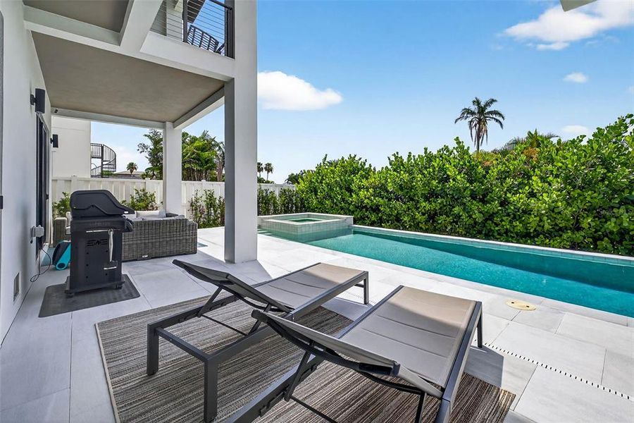 Exterior details and patio area of a home in , Redington Shores (Image 33).