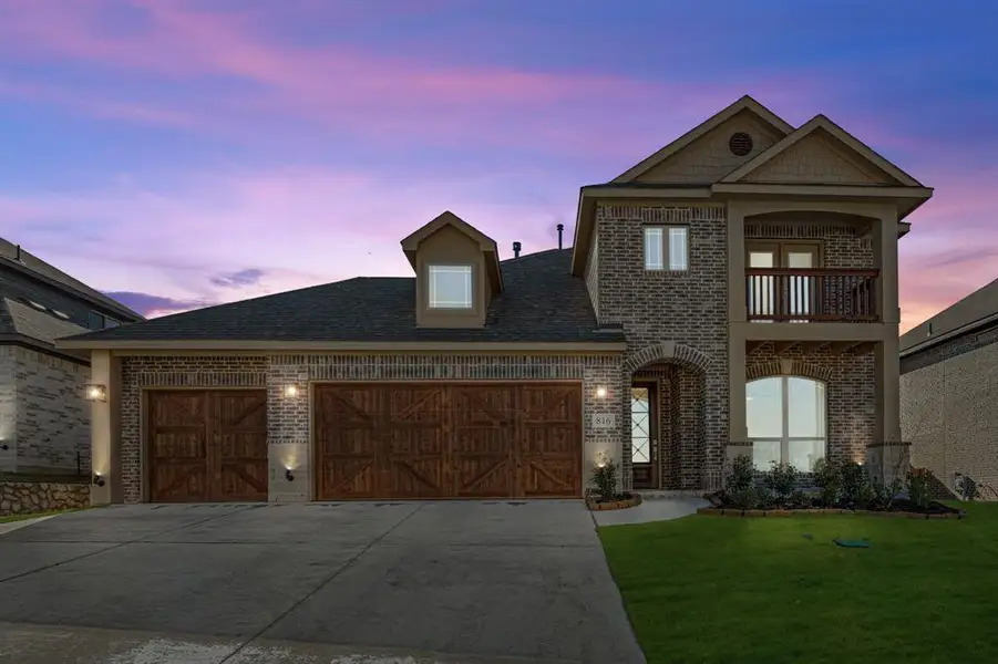 Front exterior of a new home in Homestead at Daniel Farms, DeSoto, TX, highlighting curb appeal (Image 2).