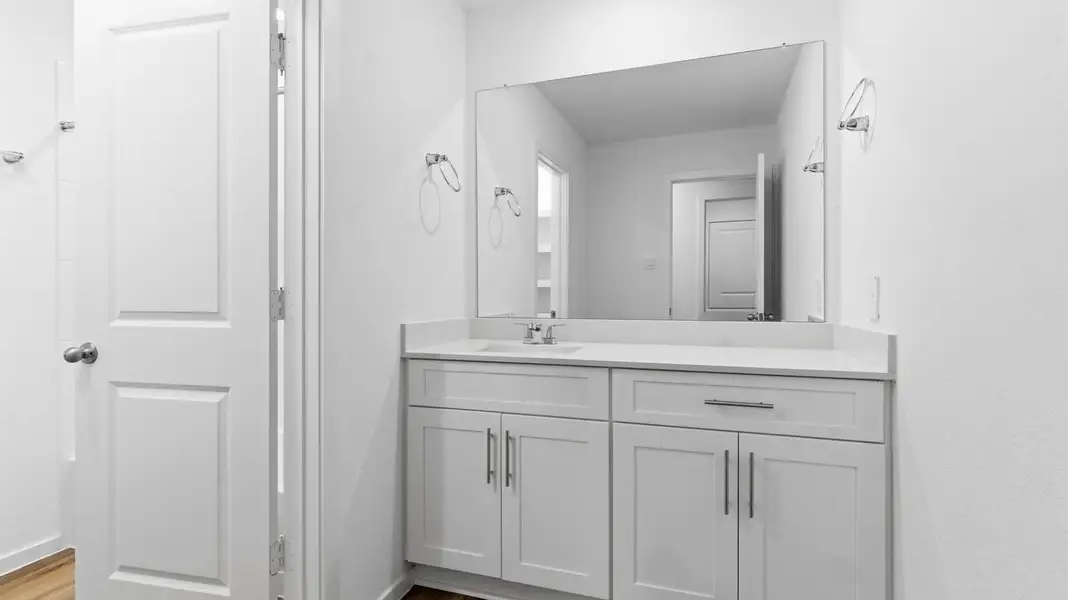 Furnished interior view inside a new home in Lakes at Westland Ranch, League City (Image 10).