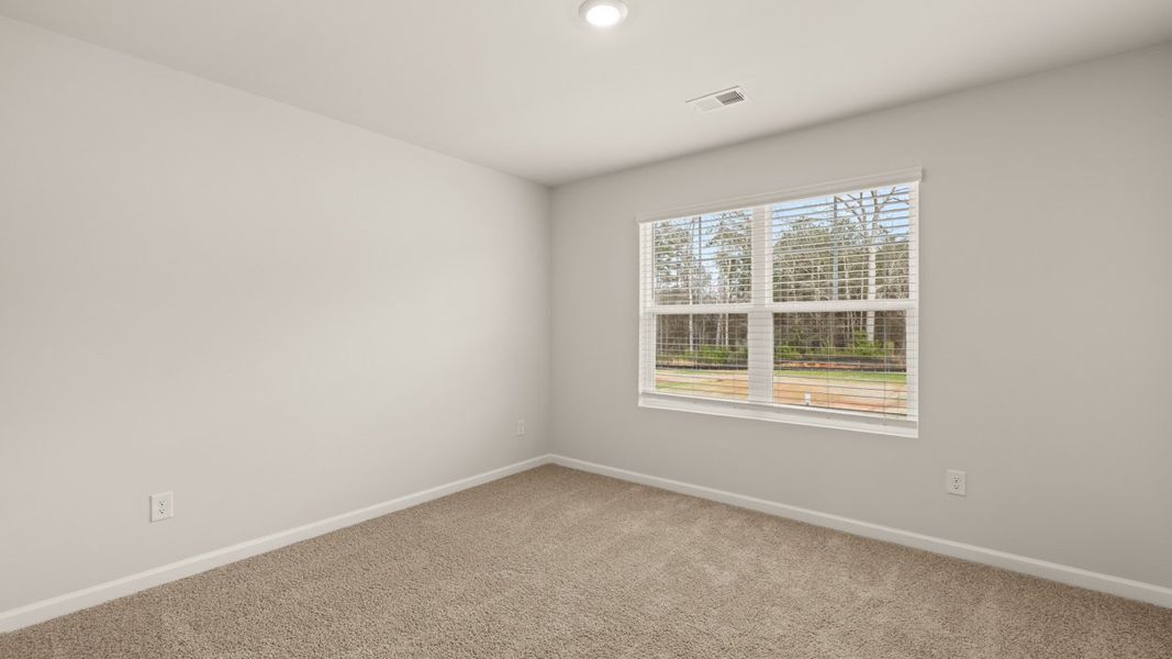 Representative unfurnished interior of a home built from the Hayden by D.R. Horton in Locust Grove Station - Cedar Ridge, Locust Grove (Image 23).