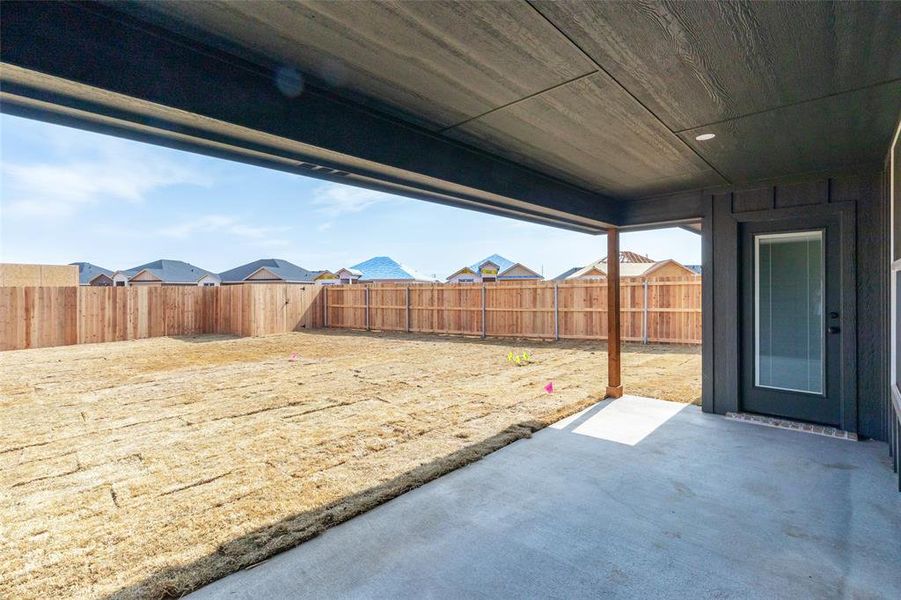 Covered patio featuring a concrete slab and recessed lighting