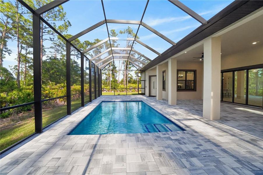 Exterior details and patio area of a home in , Port Charlotte (Image 38).