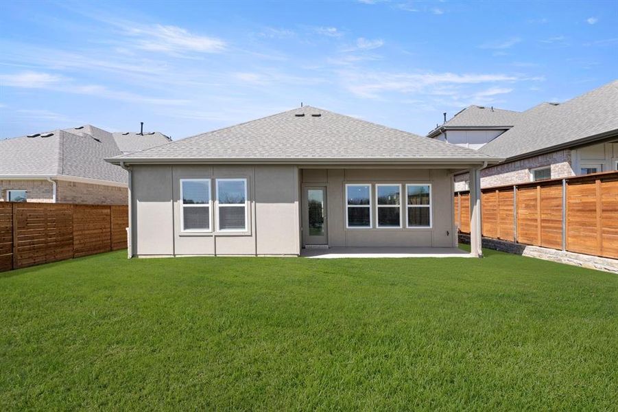 Exterior details and patio area of a home in Solterra, Mesquite (Image 4).
