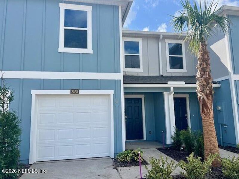 Front exterior of a new home in Corsair, Middleburg, FL, highlighting curb appeal (Image 1). Front exterior of a new home in Corsair, Middleburg, FL, highlighting curb appeal (Image 1).