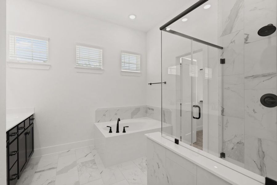 Representative furnished interior of a home built from the Cheverny by Chesmar Homes in The Woodland Hills Chateau, Willis (Image 13).