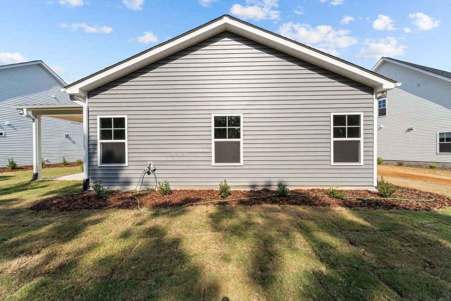 Representative exterior photo of a completed home built from the Weymouth by Caviness & Cates Communities in Bartlett Manor, Youngsville, NC (Image 164).