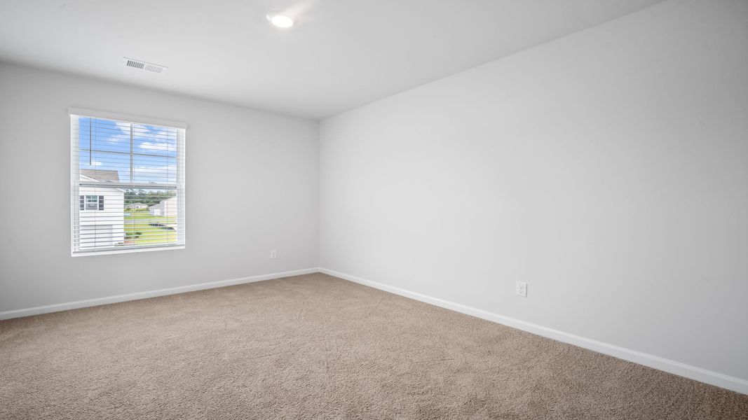 Spacious, unfurnished interior of a new home in The Lakes at North Glynn, Brunswick (Image 19).