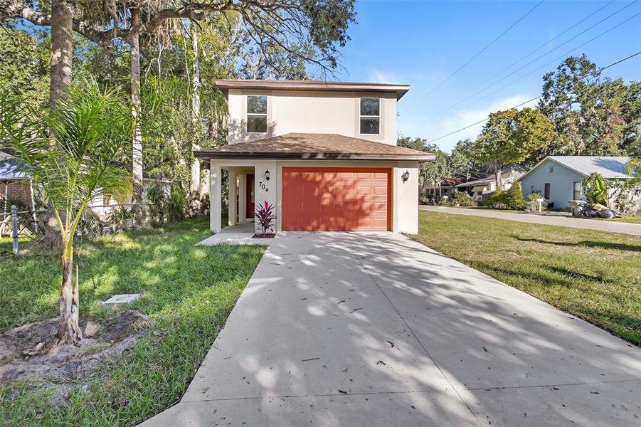 Front exterior of a new home in , Daytona Beach, FL, highlighting curb appeal (Image 2).
