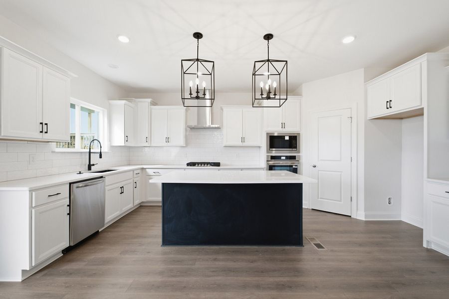 Furnished interior view inside a new home in McCain's Station, Gallatin (Image 9).