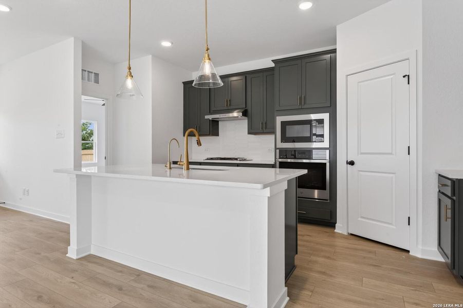 Furnished interior view inside a new home in Hennersby Hollow, San Antonio (Image 14).