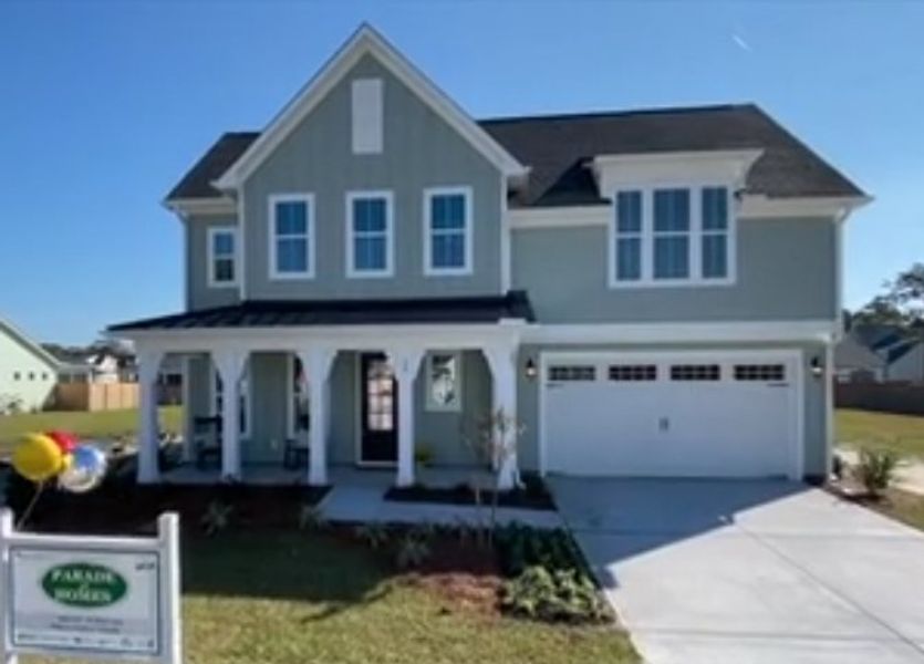 Representative exterior photo of a completed home built from the The Highland by RobuckHomes in WyndWater, Hampstead, NC (Image 29). Representative exterior photo of a completed home built from the The Highland by RobuckHomes in WyndWater, Hampstead, NC (Image 29).