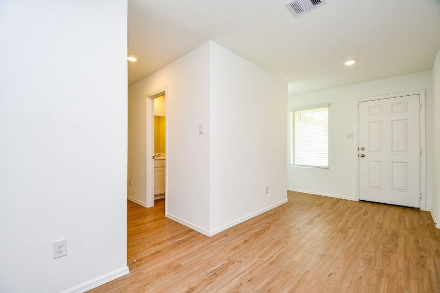 Spacious, unfurnished interior of a new home in Tavola: Cottage Collection, New Caney (Image 22).