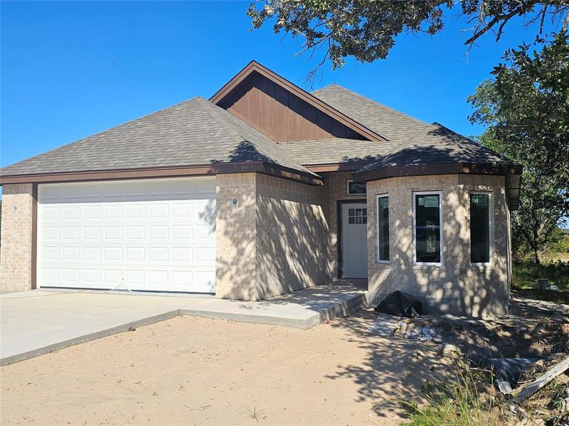 Front exterior of a new home in , Brownwood, TX, highlighting curb appeal (Image 1). Front exterior of a new home in , Brownwood, TX, highlighting curb appeal (Image 1).