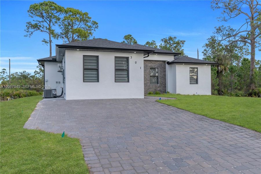 Exterior details and patio area of a home in , Lehigh Acres (Image 29).