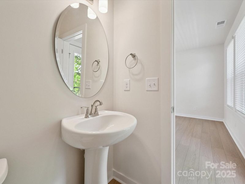 Furnished interior view inside a new home in Central Living at Craig, Charlotte (Image 7).